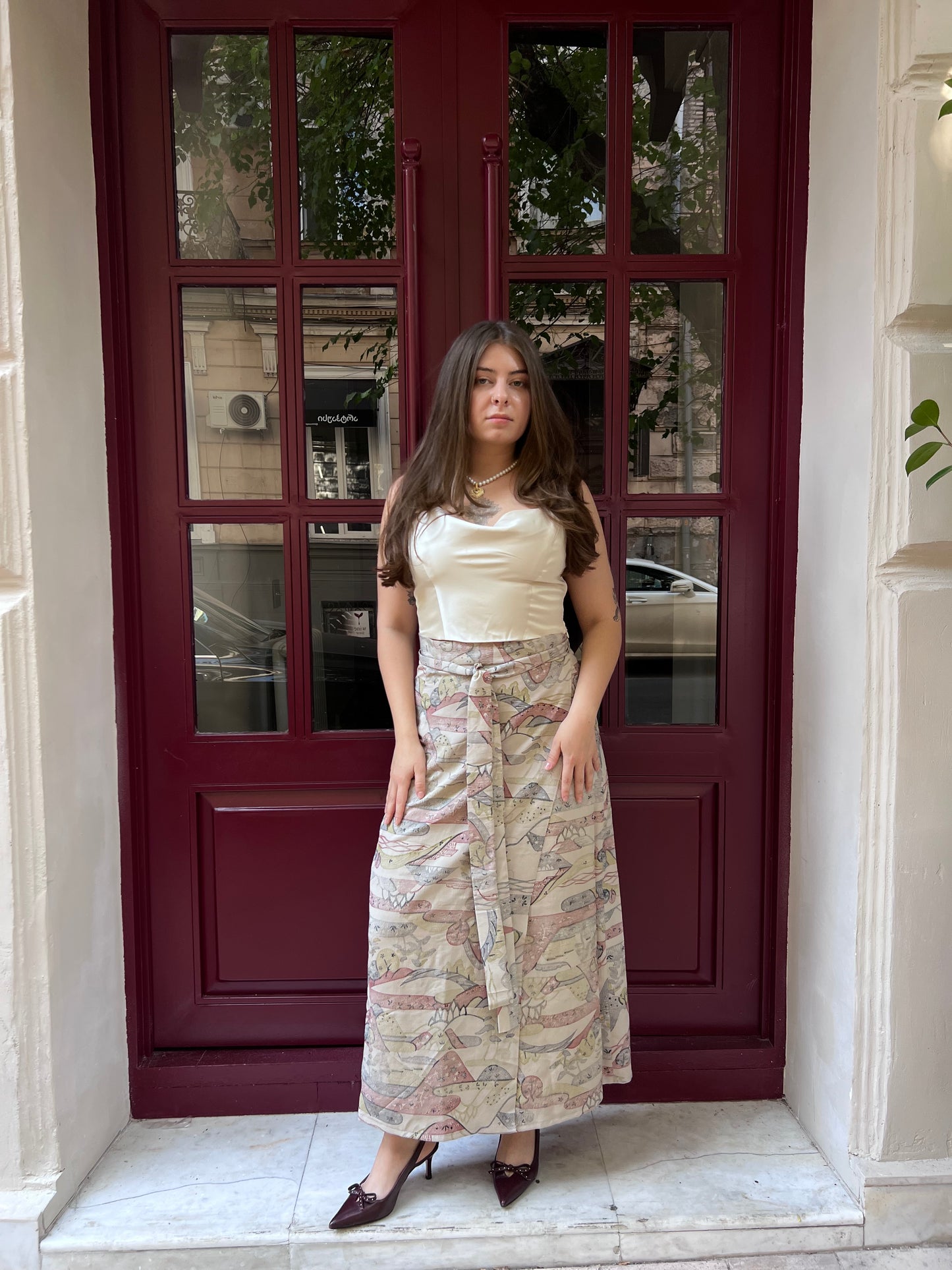 Silk skirt with village pattern